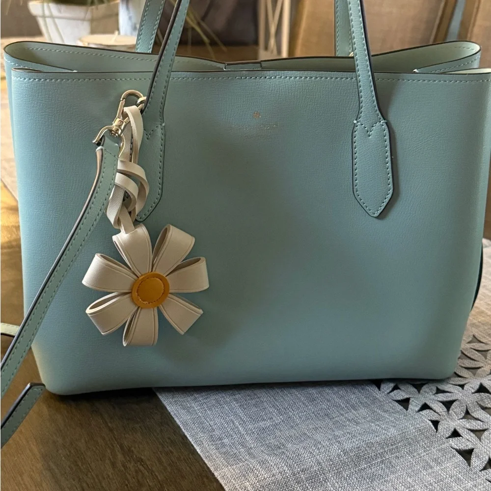 Gorgeous like new med Kate Spade Harper leather tote bag with flower bag charm. - Picture 10 of 10